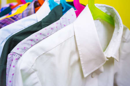 what to wear? the problem of choice is different shirts on the hangerの写真素材