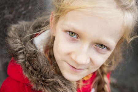 portrait  blonde girl look at the camera, close-upの写真素材