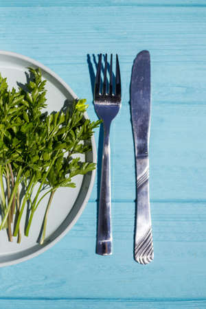 vegetarian and vegan menu - a bunch of parsley on a plate. healthy dietの写真素材