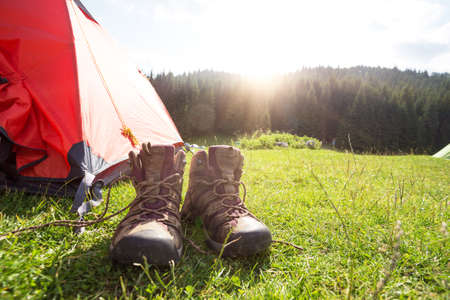 hiking boots close-up near the tent. Norwayの写真素材
