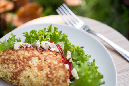 healthy nutrition in the fresh air. omelet with herbs, tomato and gorgonzola