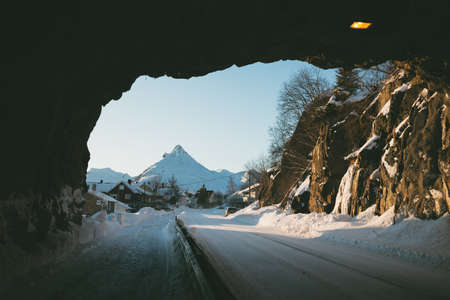 winter road through the tunnel at the norwegian mountains.  Lofoten Islands. Norway.の写真素材