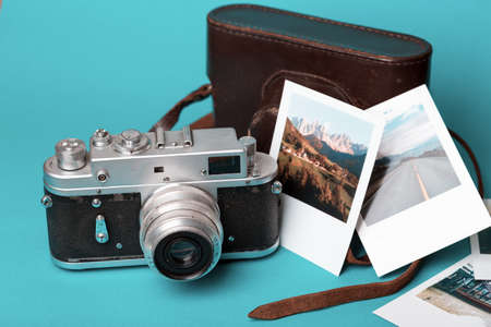 retro camera and photos on a blue background
の写真素材