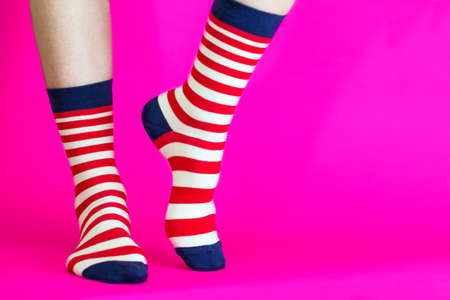 striped bright socks on a pink backgroundの写真素材