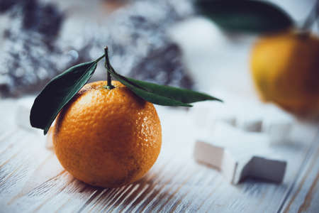 New Year background - appetizing tangerines close-up  on the table
の写真素材