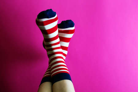 striped bright socks on a pink backgroundの写真素材