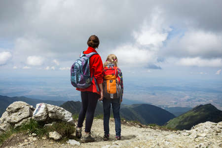 girls hiker on a path at the mountains. Transfogaras. Romaniaの写真素材