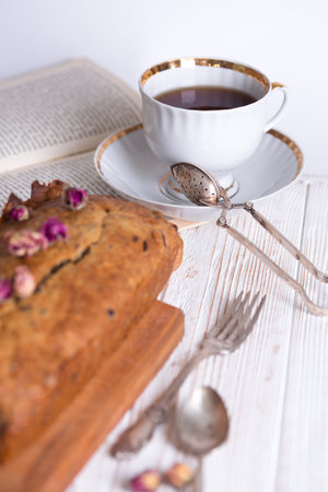 Healthy eating. Banana bread and a cup tea. vintage style