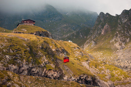 Summer Road Trip. beautiful landscape and view of a mountain road and cable road Transfagarasan....