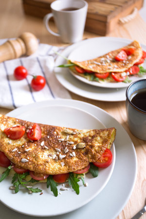 healthy nutrition. omelet with herbs, tomato and cheese