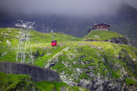 Summer Road Trip. beautiful landscape and view of a mountain road and cable road Transfagarasan....