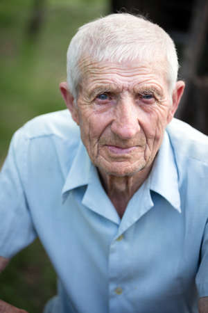 portrait of senior man close up outdoorの写真素材