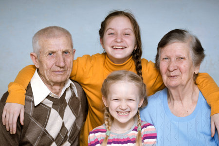 portrait of a great-grandmother, great-granddaughters and  grandfather, close-up