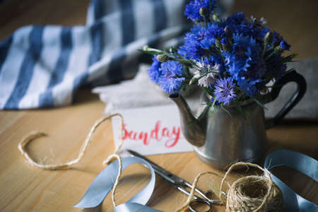 still life - Centaurea in a vintage teapotの写真素材