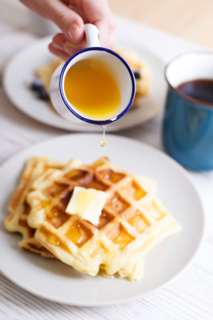 breakfast - Belgian waffles with Jostaberry and cup with tea
