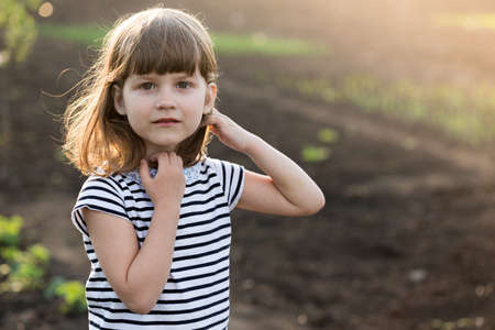 portrait Beautiful little girl in the gardenの写真素材