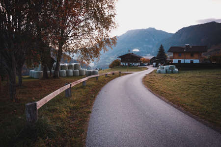 beautiful view of the valley with fog. autumn landscape in the Austrian mountainsの写真素材