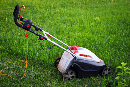 lawn mower on the lawn. garden and horticultureの写真素材