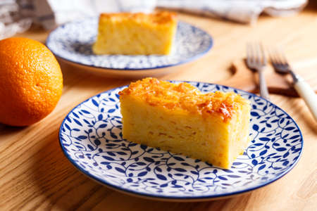 traditional greek orange pie on beautiful plates - Portokalopitaの写真素材