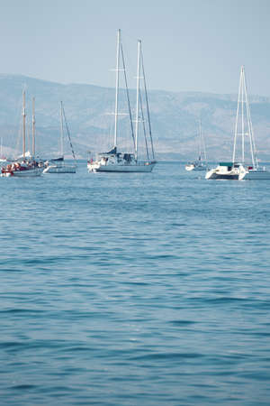 yachts in the bay and mountains in the backgroundの写真素材