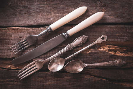 a  beautiful retro cutlery - forks, knives, spoonsの写真素材