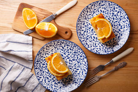 traditional greek orange pie on beautiful plates - Portokalopitaの写真素材