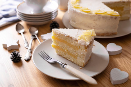 delicious lemon cake with a layer of lemon curd and cheese cream. still life. christmas dinner