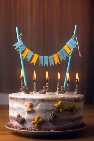dogs birthday. cake decorated with candles and bones