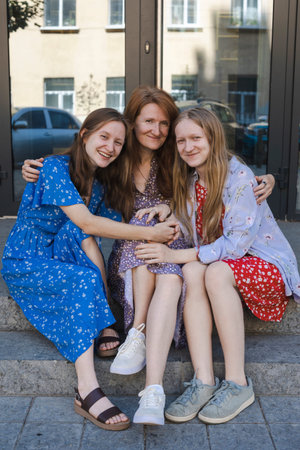 happy female generation - mother and daughters