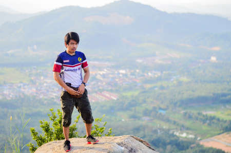 Broga Hill, Semenyih Negeri Sembilan, MALAYSIA - 22 August 2015. A bunch of people hiking and doing an outdoor Merdeka activity at Broga Hill, Semenyih Negeri Sembilan, Malaysia.のeditorial素材