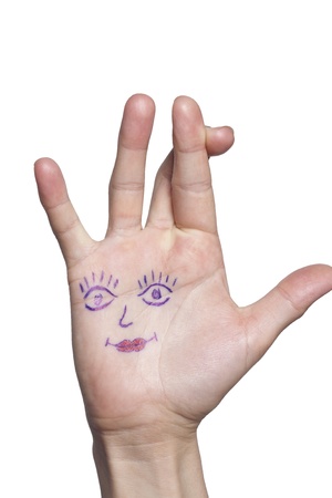 Female hand with painted eyes and lipsの写真素材