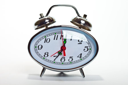 Alarm clock, isolated on the white background, clipping path included 