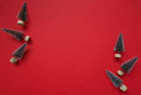 Christmas decorations on red background, flat lay. Space for textの写真素材
