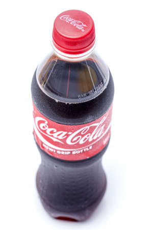 SABAH, MALAYSIA - March 08, 2015, Coca Cola bottles with bright backgroundのeditorial素材