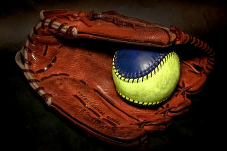 Closeup of a Softball Glove and ballの写真素材
