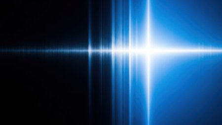 This image depicts a striking visual of a radiant blue light beam emanating from the center, spreading outwards in a symmetrical pattern. The beam is set against a dark background, creating a stark contrast that accentuates its brilliance and intensity. The light appears to be composed of multiple thin, parallel lines that converge at the center, giving it a sense of depth and dimension. The overall effect is one of clarity and focus, with the blue hue adding a calming yet powerful aesthetic.の素材
