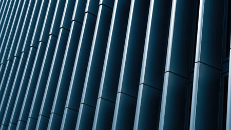 This image showcases a modern building facade characterized by its sleek design and vertical panels. The panels are arranged in a repeating pattern, creating a visually striking and symmetrical appearance. The color of the panels is a deep, rich blue, which contrasts with the white lines that separate each panel. The design is likely intended to enhance the aesthetic appeal of the building while also providing some level of functionality, such as shade or insulation.の素材