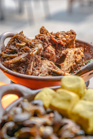 Duck meat on the jug plate and the front object is blurredの写真素材