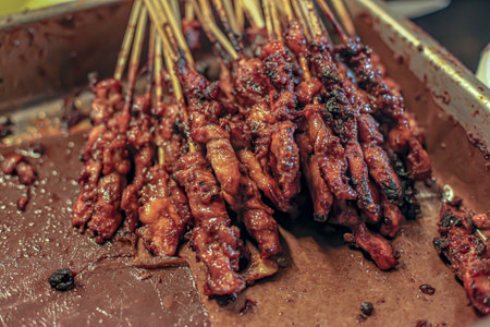 Madurese chicken satay is finished grillingの写真素材