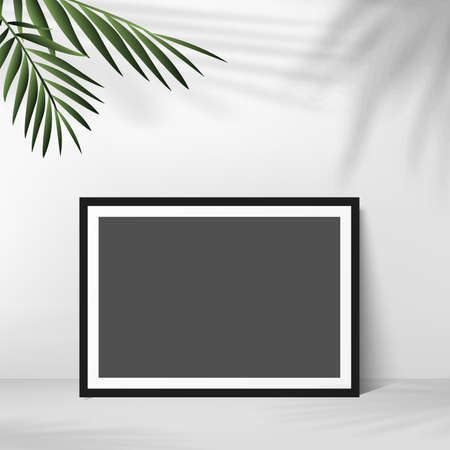 Black photo frame with palm leaves in white background. Vector.のイラスト素材