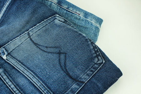 Close up of jeans or denim pants isolated on white background.の写真素材