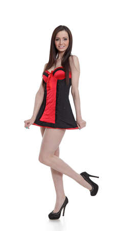 Attractive brunette smiling on high heels and sexy outfitのeditorial素材