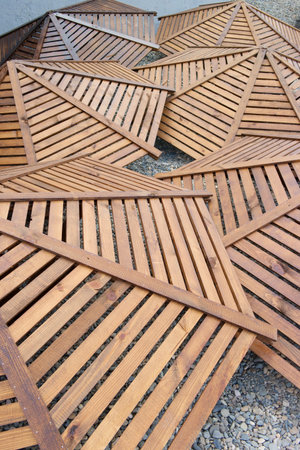 wooden umbrellas on the beach