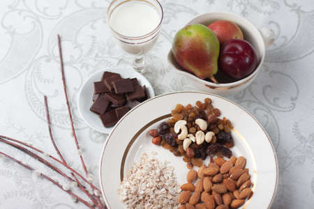 still life with nuts, fruits and chocolateの写真素材