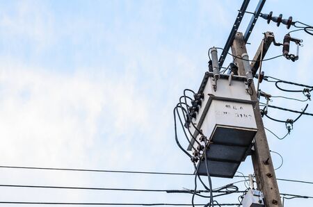 Transformer on the pole on the streets of Bangkok.の写真素材