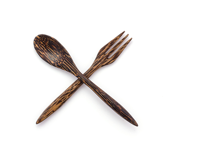Wooden spoon and fork on white backgroundの写真素材