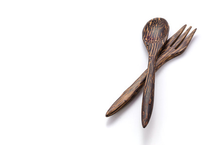 Wooden spoon and fork on white backgroundの写真素材