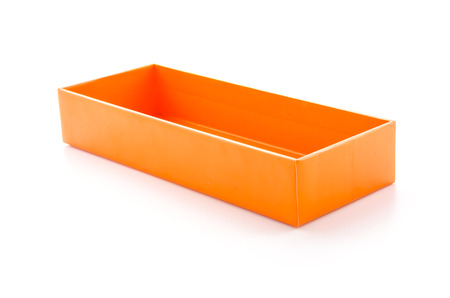 Orange cardboard box on white backgroundの写真素材