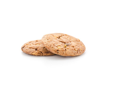 chocolate chips hazelnut cookies on white backgroundの写真素材
