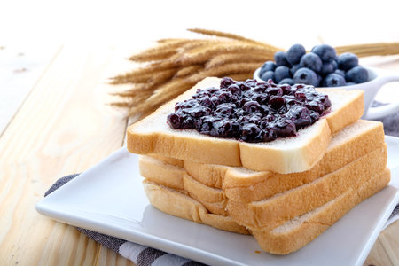 slice of bread with jam blueberry